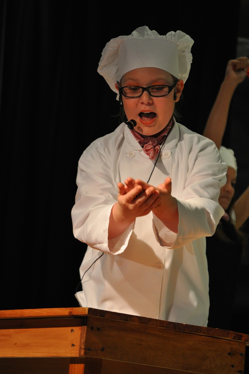 Sixth-grader Hannah Badenhorst portrays Chef Louis.