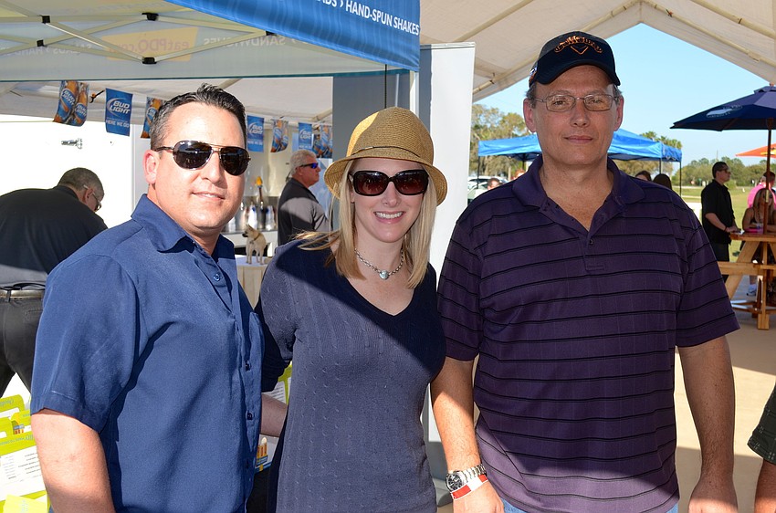 Chad Ciaravella, Lori Hagey and David Sams spend time with friends.