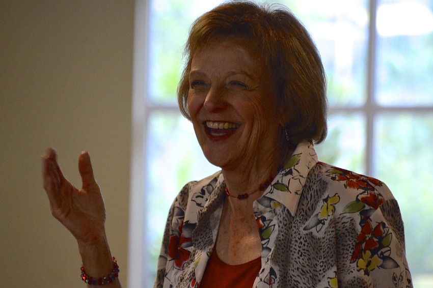 Charlotte Cooper laughs with the crowd.