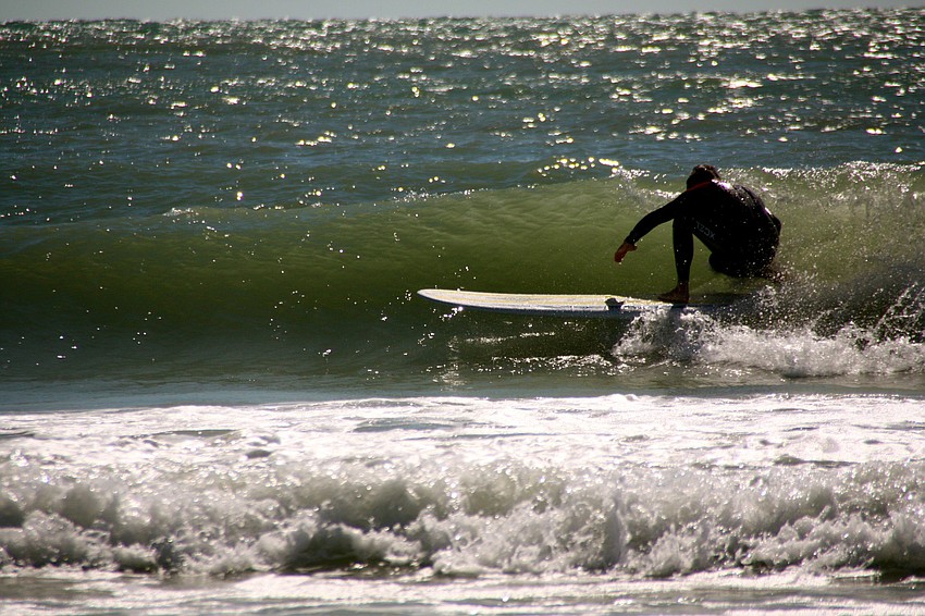 Surfers at Lido Beach.