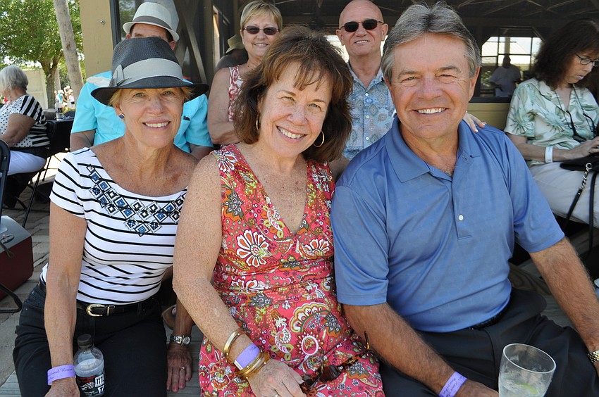 Karen Miller with Sarasota residents Kathie and Mike Roberts.