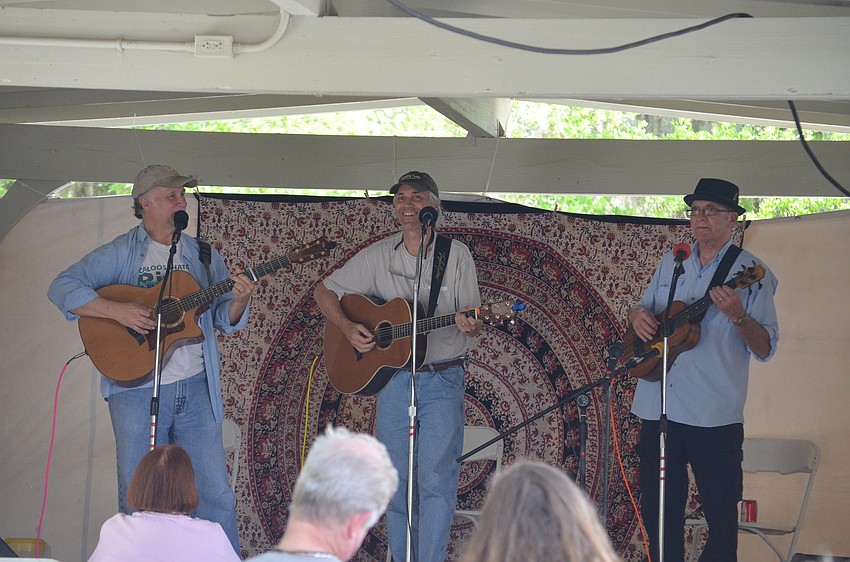 Pete Price, Mike Jerguson and Pete Henning play at the Oak Stage.