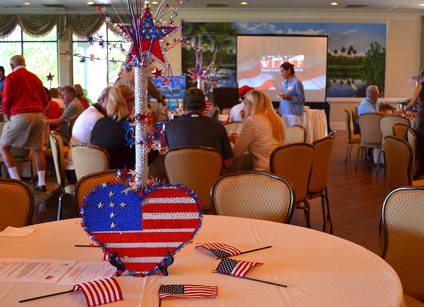 The centerpiece on each table featured the Operation Kindness logo.