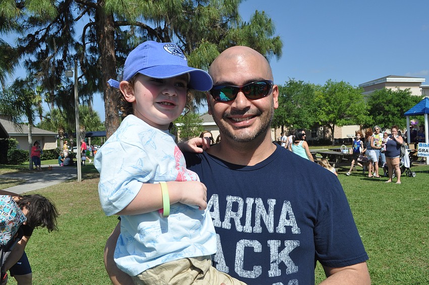 Tony Gonzalez with his son, Gavin, 3