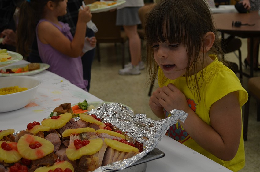 Abby Morrison eyes the ham.