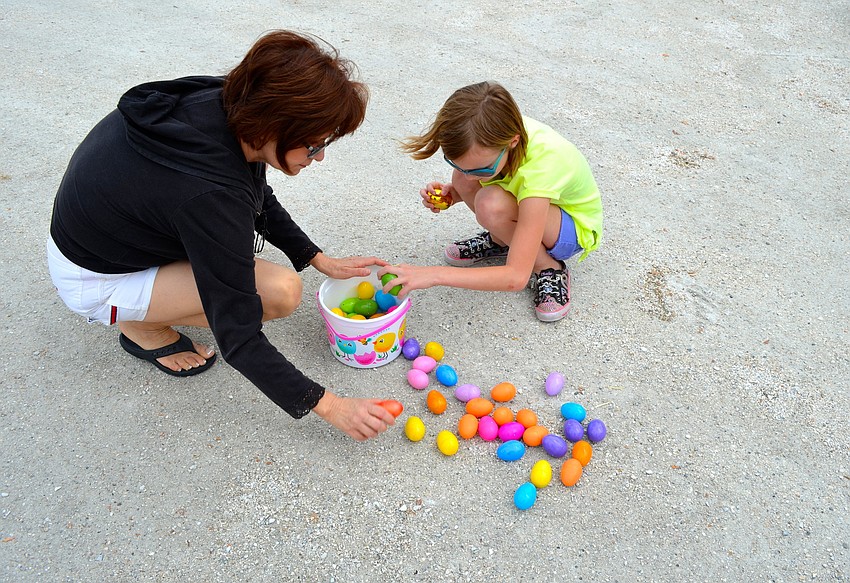 Kala Cooper goes through her basket.