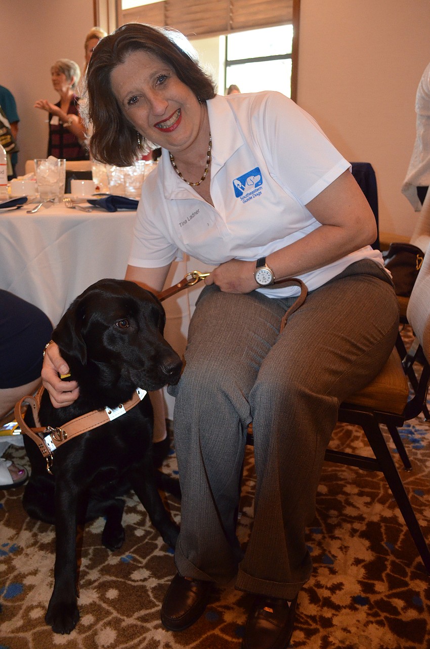 Graduate Tina Ladner and guide Tangerine