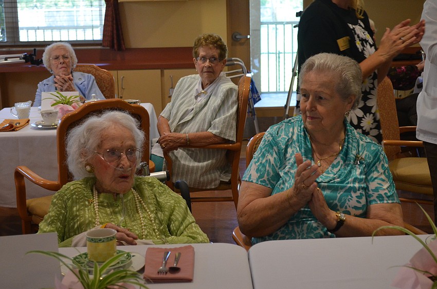 107 year-old Catherine Penman with Pines of Sarasota volunteer Kit Weaver