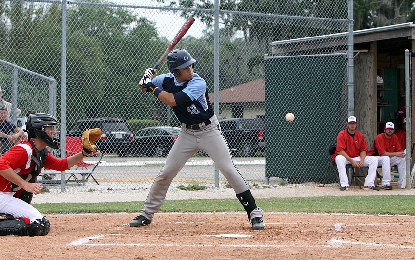 Out-of-Door Academyâ€™s Desmond Lindsay, No. 42, prepares to swing.