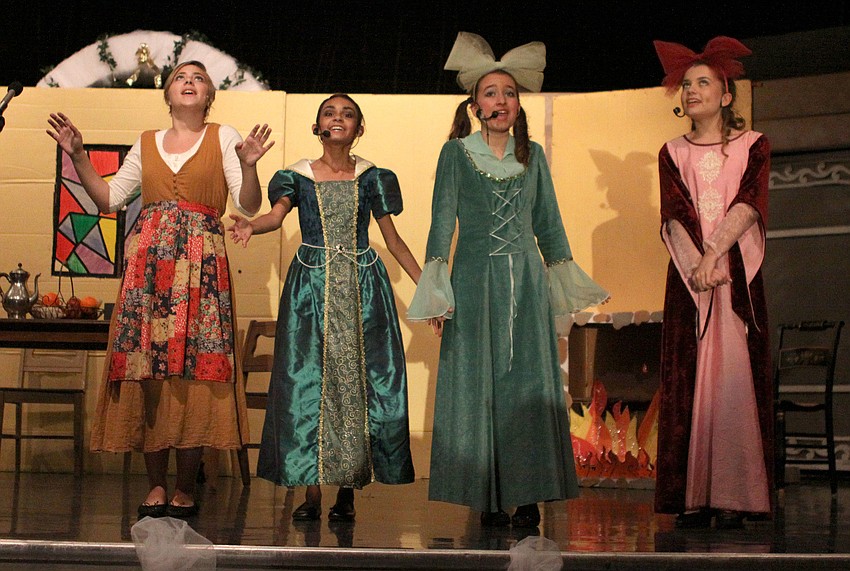 Cinderella, Paige Merriman, Stepmother, Chloe Burgos, Joy, Madison Chaney, and Portia, Carrie Dutting, sing â€œWhen Youâ€™re Driving Trough the Moonlight/ A Lovely Nightâ€.