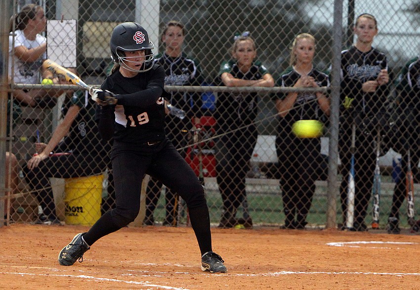 Strawberry Crestâ€™s Aly Masessa, No. 19, goes to swing at the ball.