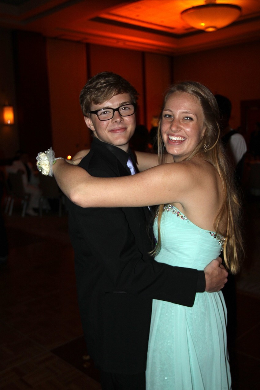 Luke Lambert and Kelly Crocker dance together out on the dance floor.