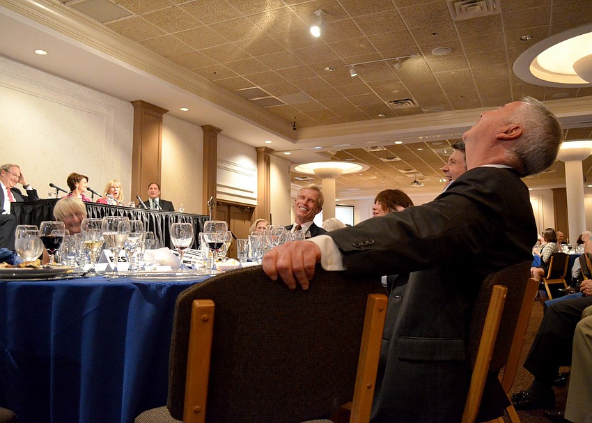 Rick De Furia laughs during the presentation.