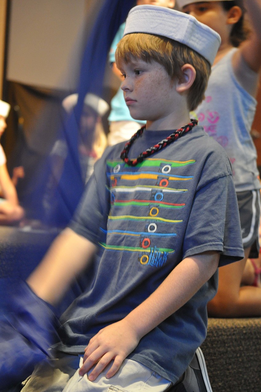 Jonathan Stone helps make waves to rock the boat in which Jonah, the prophet was traveling.