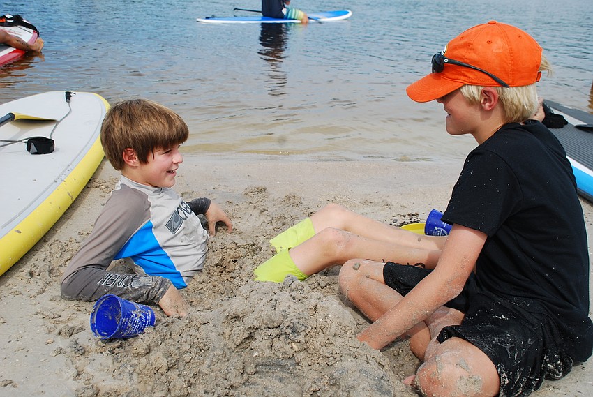 Logan Nagler and Riley Peterson played in the sand.