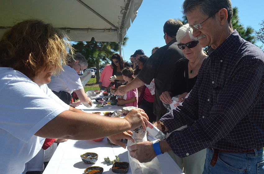 Tom Kocourek buys a hand made bowl