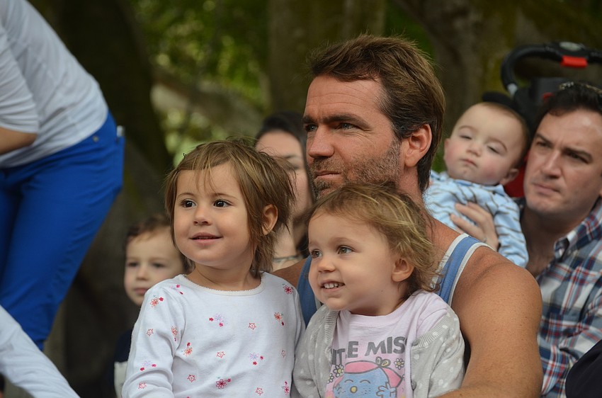 Josh Johnson with his daughter, Picci, right, and Lively Pinelli, left.