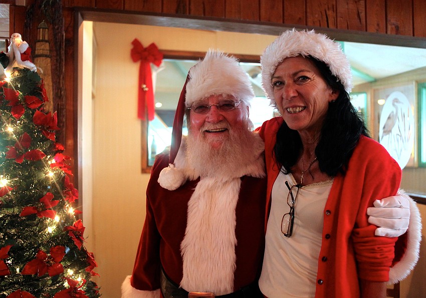 Judy Rudd with Santa.