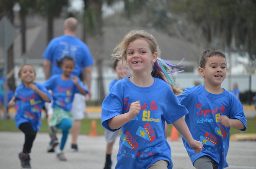 Autumn Roscoe runs her first lap.