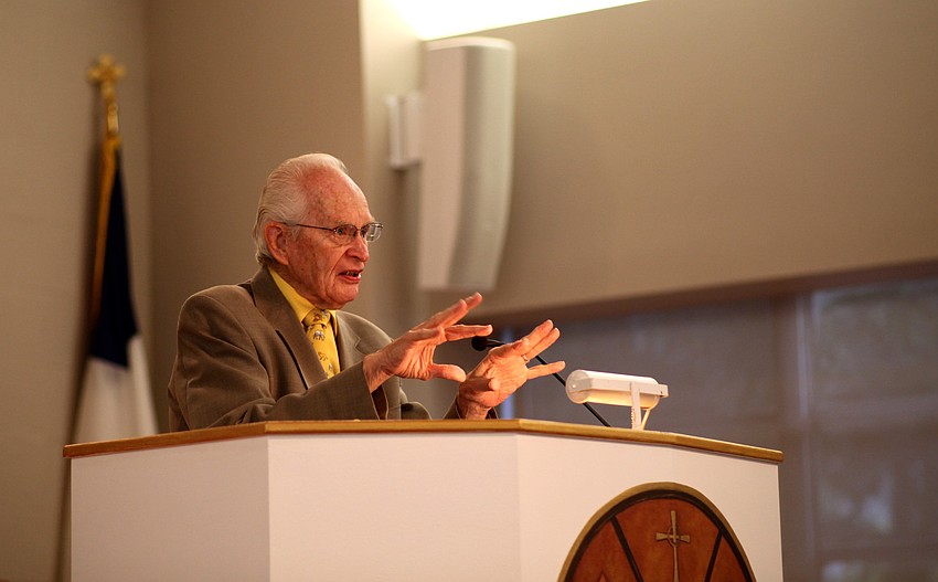 Dr. Jack Barnes animatedly tells stories of his long career.