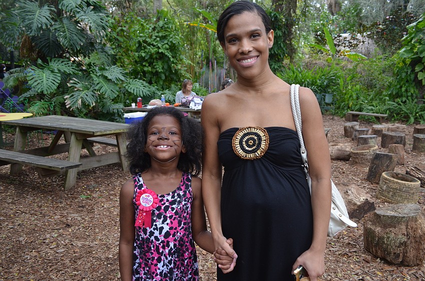 Taniyah Porter celebrates her seventh birthday with mom, Toccara at Paws for Cause.