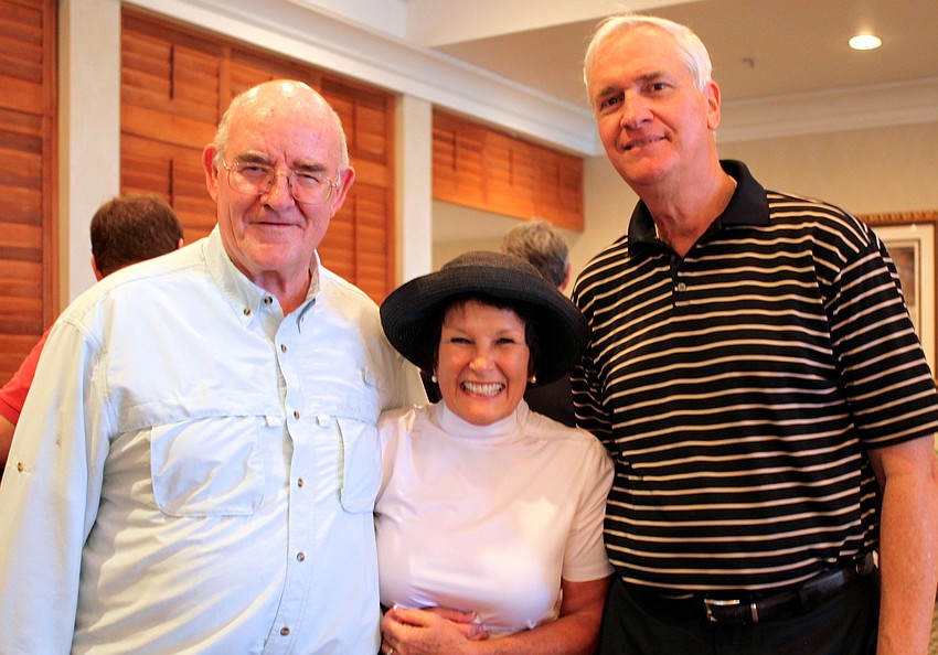 Monsignor Gerard Finegan, Sandy Finnegan and Mark Schaefer