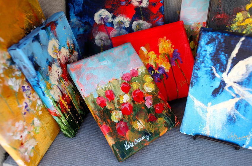 Small paintings by Kate Carney were sold at her booth.