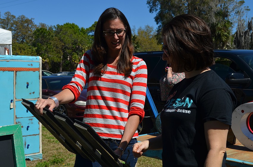 Abby Weingarten helps Rebekah Nouri shop.