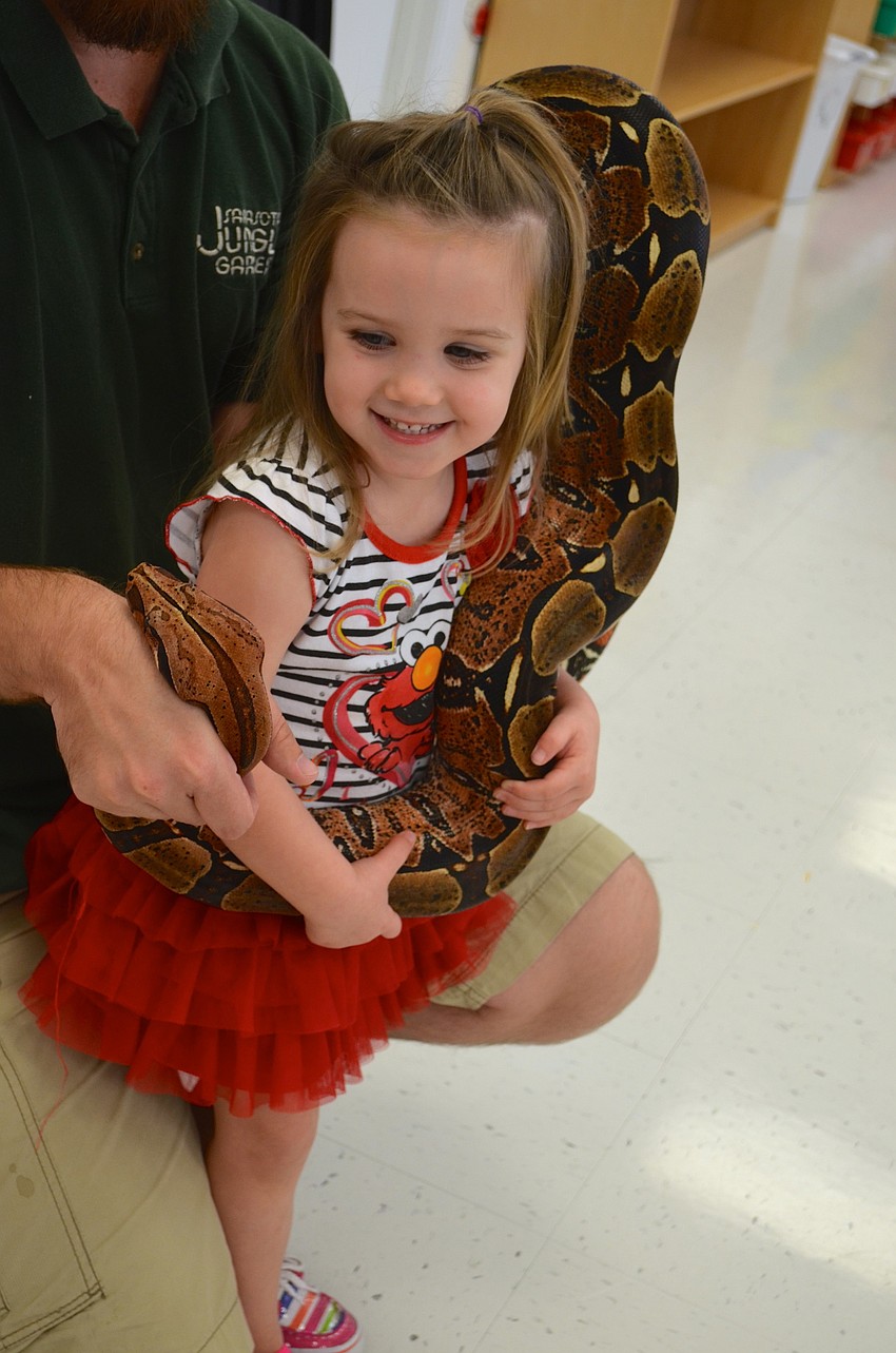 Four-year-old Kiley Milheim likes snakes.