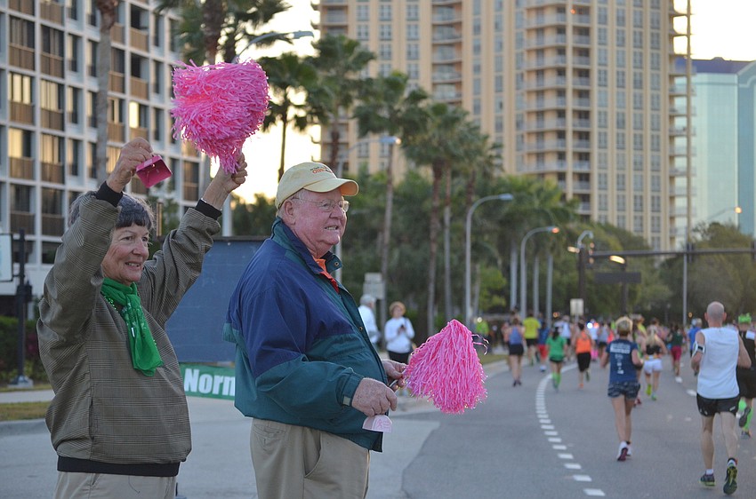 Connie and Rooney Mereness cheer.