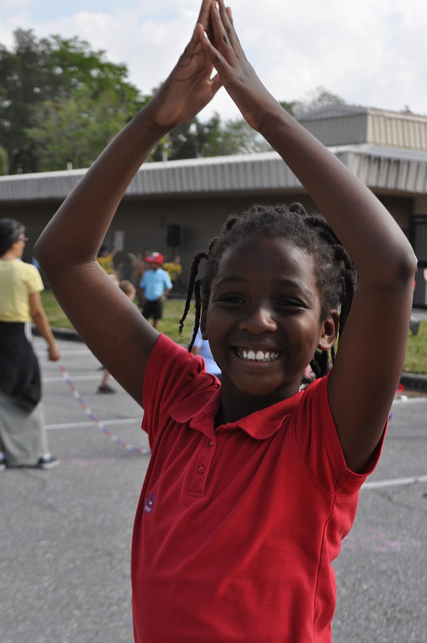 Eight-year-old Edwin Cerisier dances the 