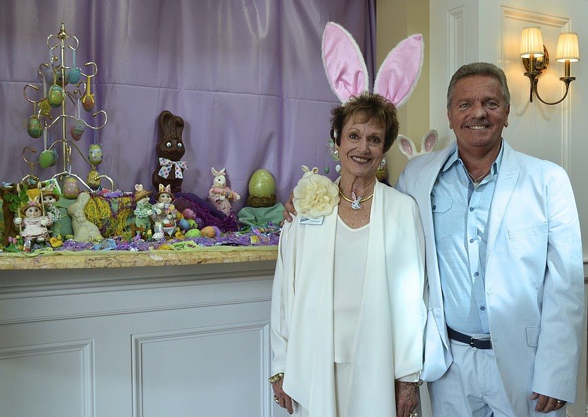 Karen Gallagher and Rob Edwards pose with Edwardsâ€™ Easter display.