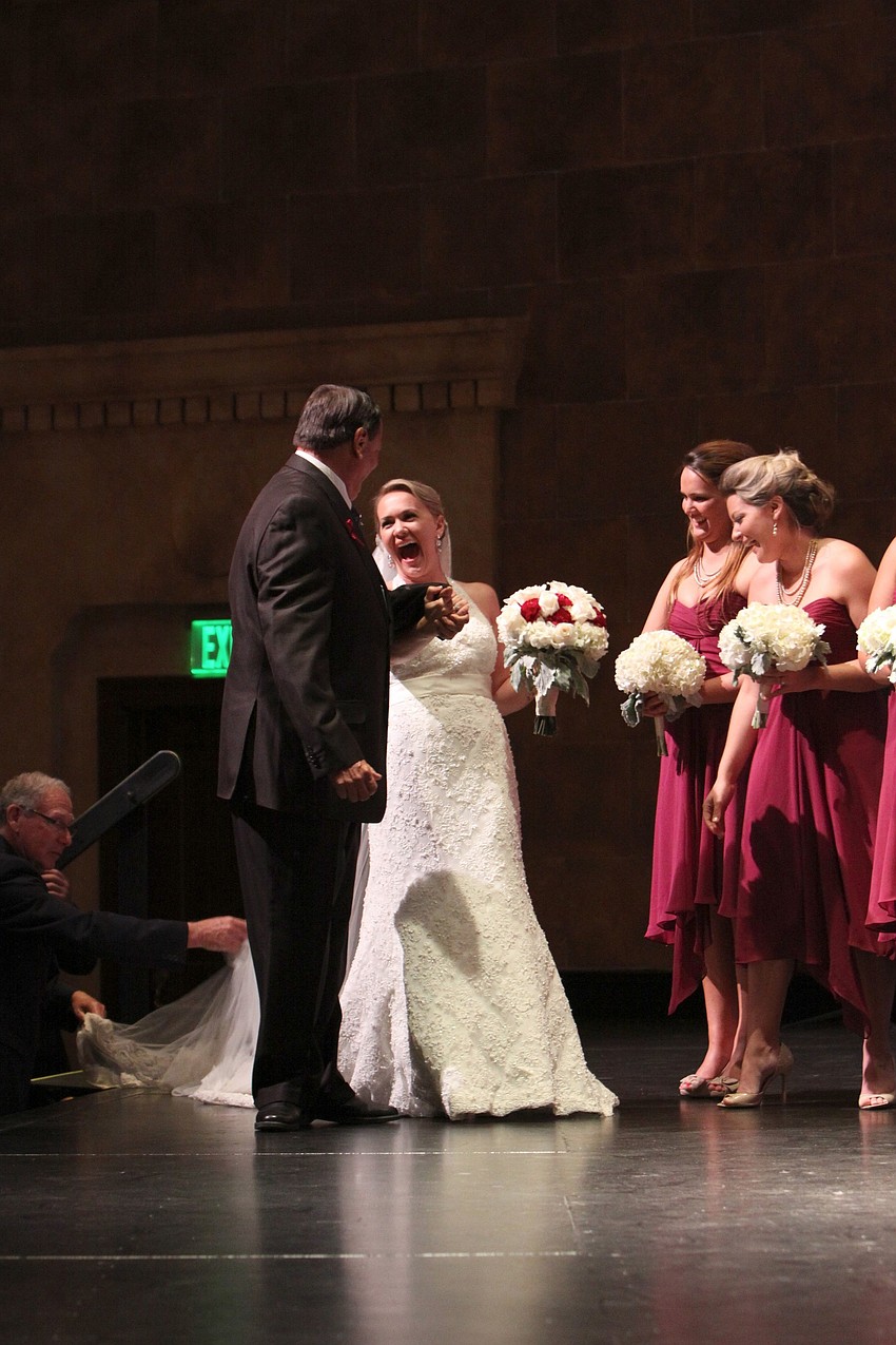 Emily Forbes' veil got caught on the way up the stairs onto the stage. There was much laughter that followed the incident.