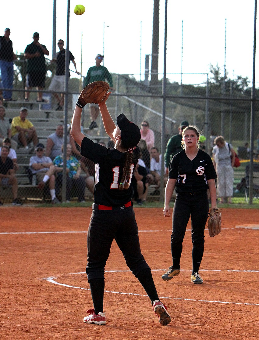 Strawberry Crestâ€™s Jackie Sanelli, No. 11, goes to catch a pop fly.