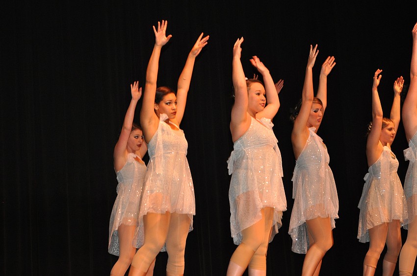 Braden River High Schoolâ€™s Black Pearls, the varsity dance team, waved their arms to â€I gave you all.â€