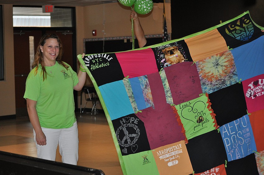 Nikki Lowe, Lexiâ€™s mother, showed off a quilt made from Lexiâ€™s t-shirts.