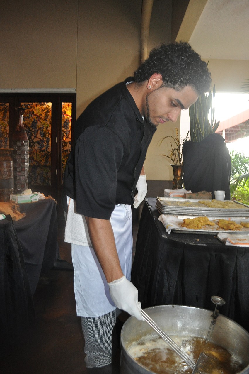Polo Grillâ€™s Billy Urena fried catfish.
