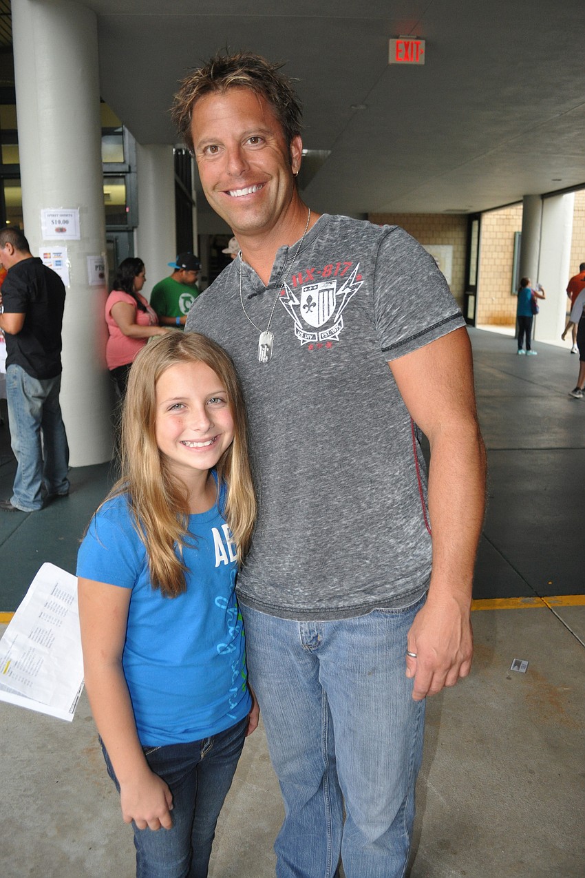 Dave Merigliano with his sixth grade daughter, Samantha, who transferred to Braden River Middle School from Sarasota.
