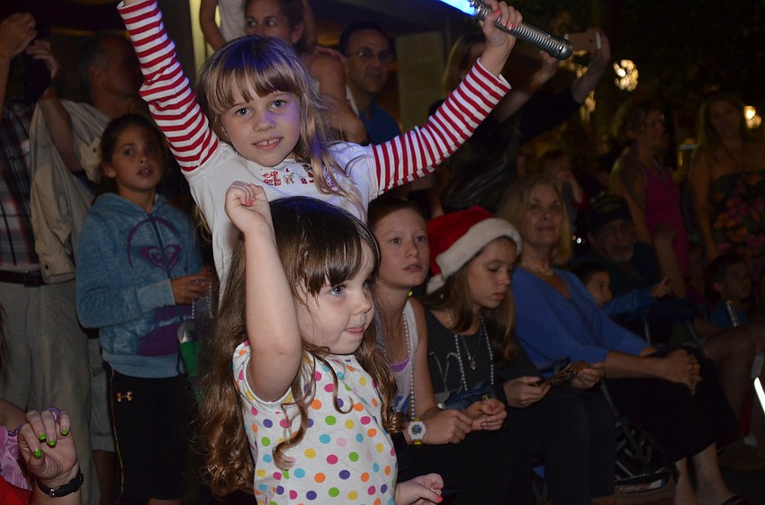 Emily Rosiek and little sister Bailey cheer