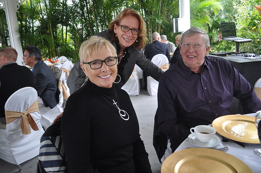 Rebecca Ronan of Bridge a Life, Bernie Gottschalk of Visit Sarasota and Larry Rued, a friend of the Mixons
