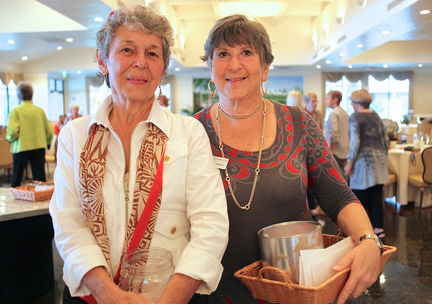 Jane Boehme and Jackie Salvino greet attendees at the door.