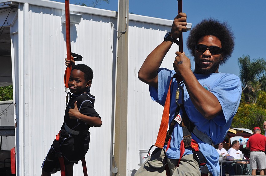 Jason Hicks, 9, and Stanton King took pride in finishing the zip line.