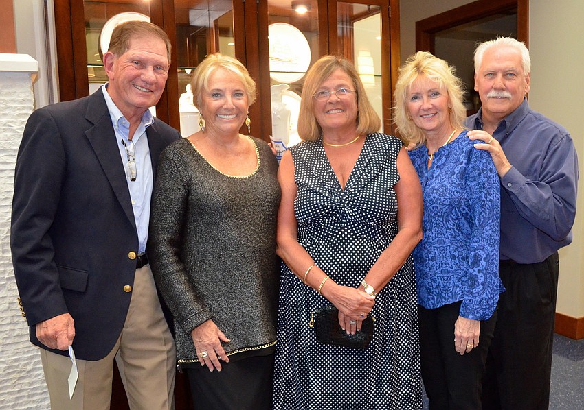 Bob and Judie Gustafson and Anne Fiore with Benny and Leo Briton