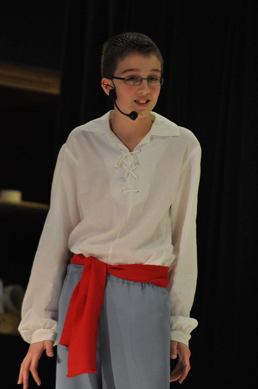 Spencer Waid, as Prince Eric, finds Ariel washed up on the shore.