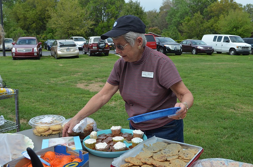 Maria Wright organizes the desserts.