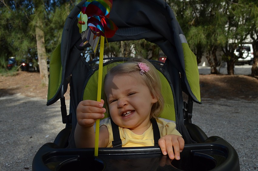 Gracie Franklin enjoys her pinwheel.