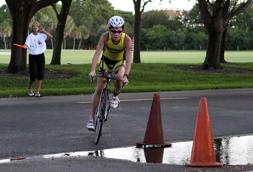 Jessica Crate, No. 51, heads towards dismount area at the end of the biking portion of the sprint triathlon.