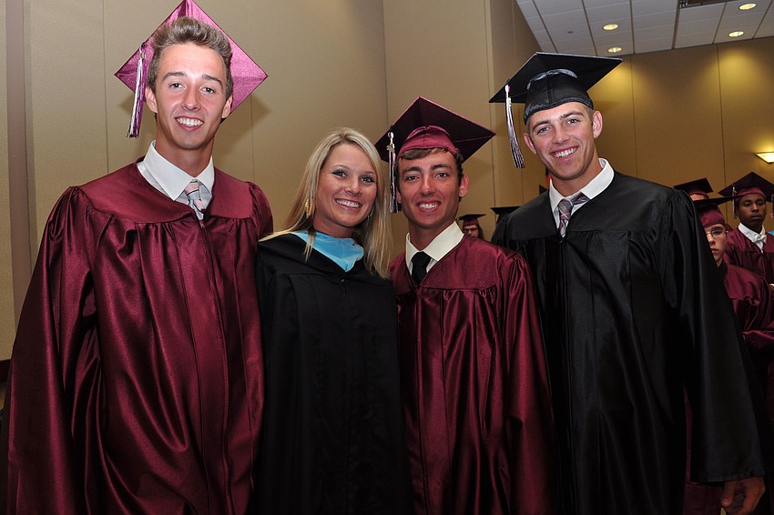 Colin Thomsen, teacher Erin Buchanan, Drew Lalor and Alec Neuzil