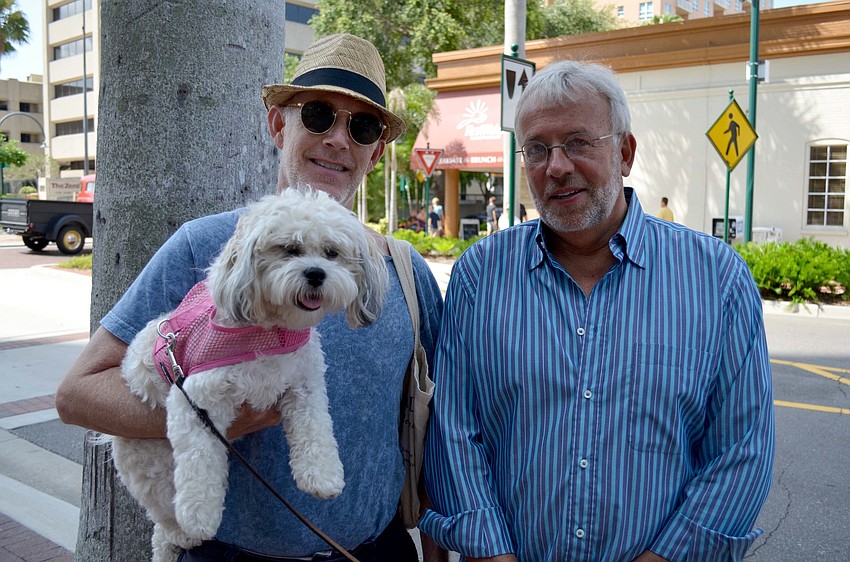 Doug Winn and Del Bradshaw with their dog, Hope