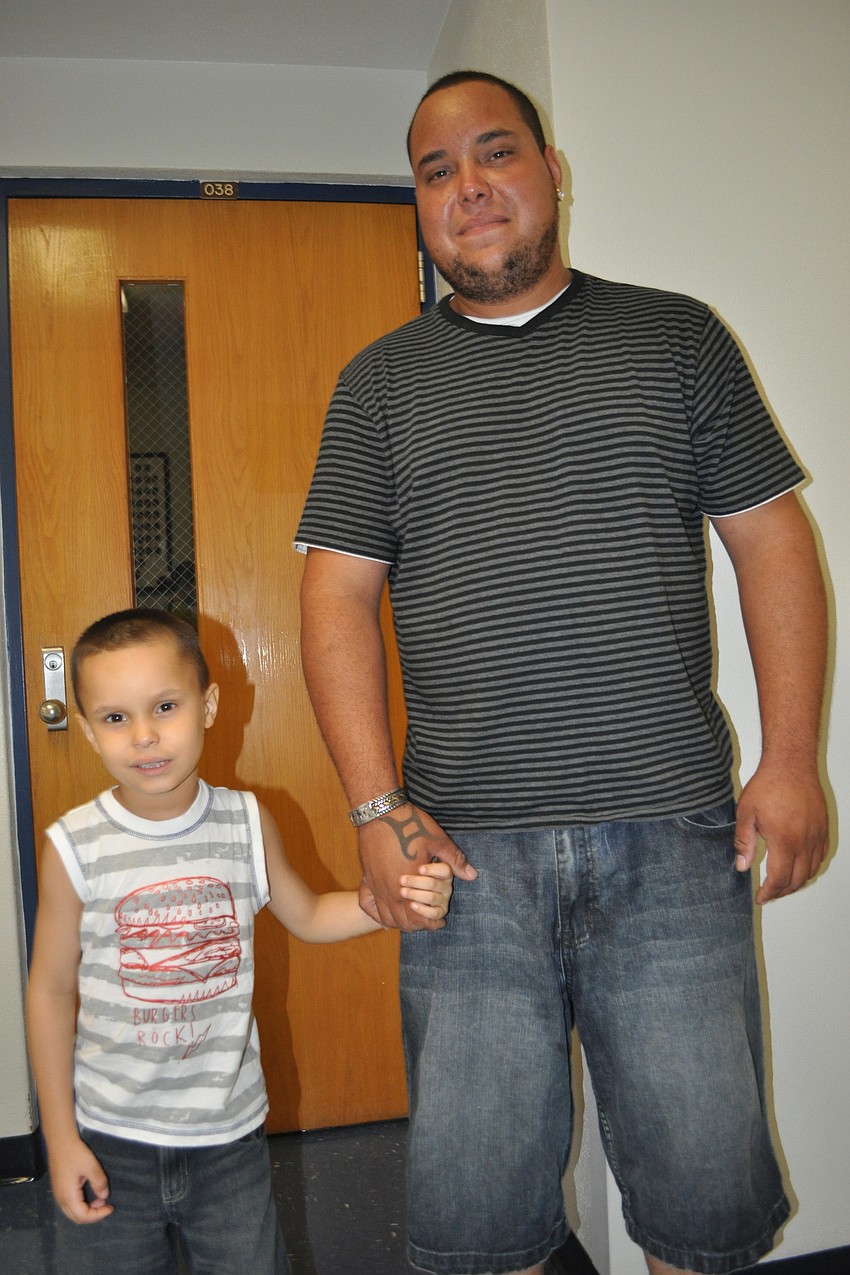 Miguel Felix with his son, Carlos, a fourth grader at Bashaw Elementary School